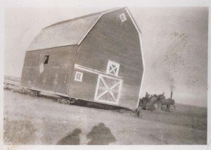 Moving the barn from Robinson to the ranch. The barn is still in use today.